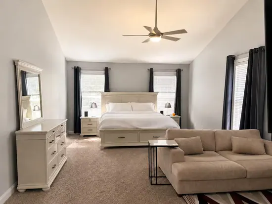 Spacious primary bedroom and sitting space